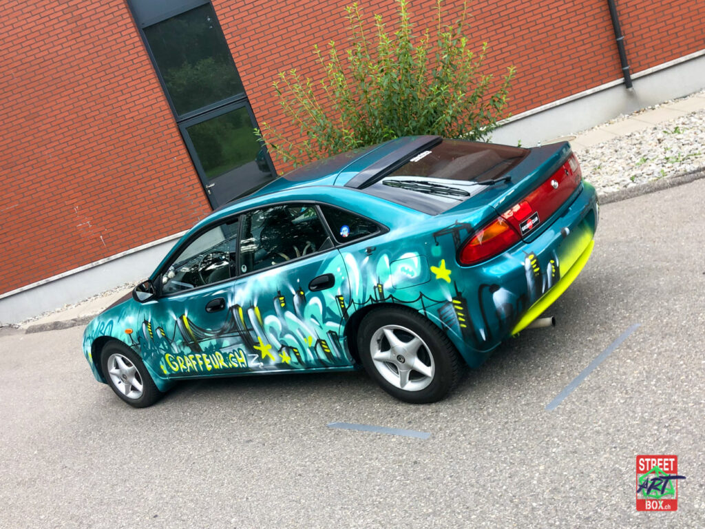 Mazda-Turquoise-Voiture-Graffiti-Street-art-car-Suisse-Graffeur-arr